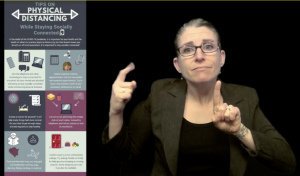 Regan is interpreting "point/goal" in a still frame with a brochure on the left: TIPS ON PHYSICAL DISTANCING While Staying Socially Connected"